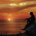 manipulation, sunset, sunrise, boy, thinking, rock, silhouette, birds, brown thinking, nature, brown sunrise, brown rock, brown think